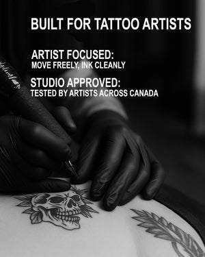 Tattoo artist wearing black nitrile gloves working on skull tattoo – studio-tested gloves trusted by artists across Canada for clean, precise tattooing.