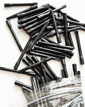 Box of 100 COZ disposable tattoo ink mixer sticks for blending pigment colors.