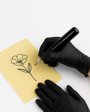 Tattoo artist using COZ realistic silicone practice skin with tattoo pen – ideal for beginner and advanced design practice.