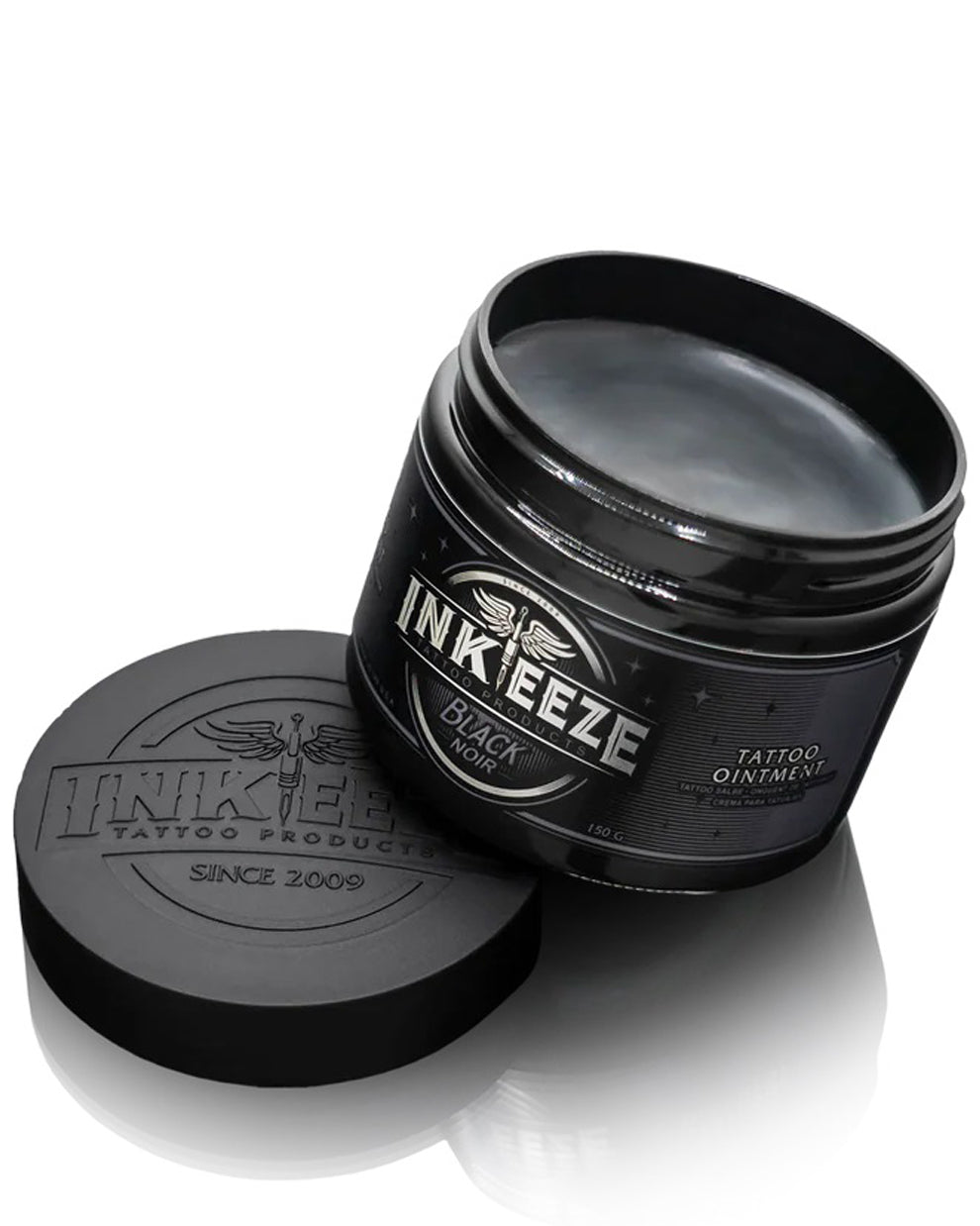 Open jar of INKEEZE Black Tattoo Ointment 150g by COZ Tattoo Supplies Canada, pro tattoo aftercare balm with non-petroleum black glide