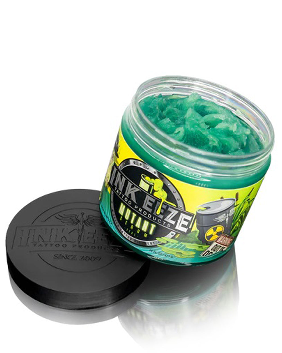 Open jar of INK-EEZE Mutant Serum Green Tattoo Ointment 16oz by COZ Tattoo Supplies Canada, vegan tattoo aftercare balm showing texture