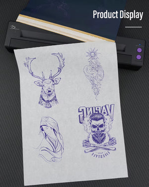 Various tattoo stencil designs printed on transfer paper.