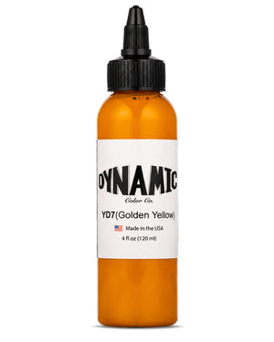 A 4 fl oz (120 ml) bottle of Dynamic Color Co. YD7 Golden Yellow tattoo ink, featuring an amber-colored bottle, a white label, and a black cap, set against a plain white background.