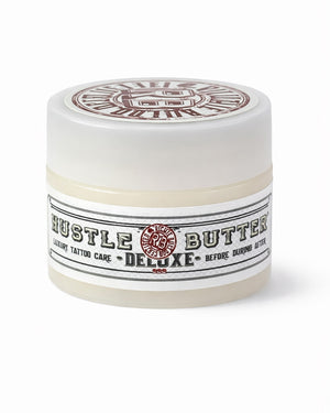 Hustle Butter Deluxe tattoo care balm jar on white background, professional studio product photo, Coz Tattoo Supplies