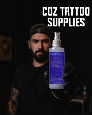 Tattoo artist showing stencil prep spray bottle – premium stencil application product from COZ Tattoo Supplies Canada.