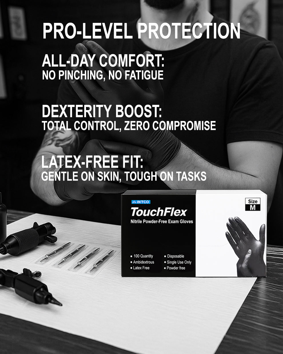 Black TouchFlex nitrile gloves worn by tattoo artist in studio setup with cartridge needles and tattoo machine – Size M, latex-free, powder-free, pro-grade fit.