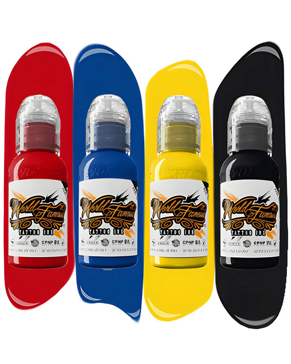 World Famous Traditional Mini Tattoo Ink Set 4 bottles 1oz each red blue yellow black with color splash background showcasing bold pigment saturation professional tattoo ink set COZ Tattoo Supplies