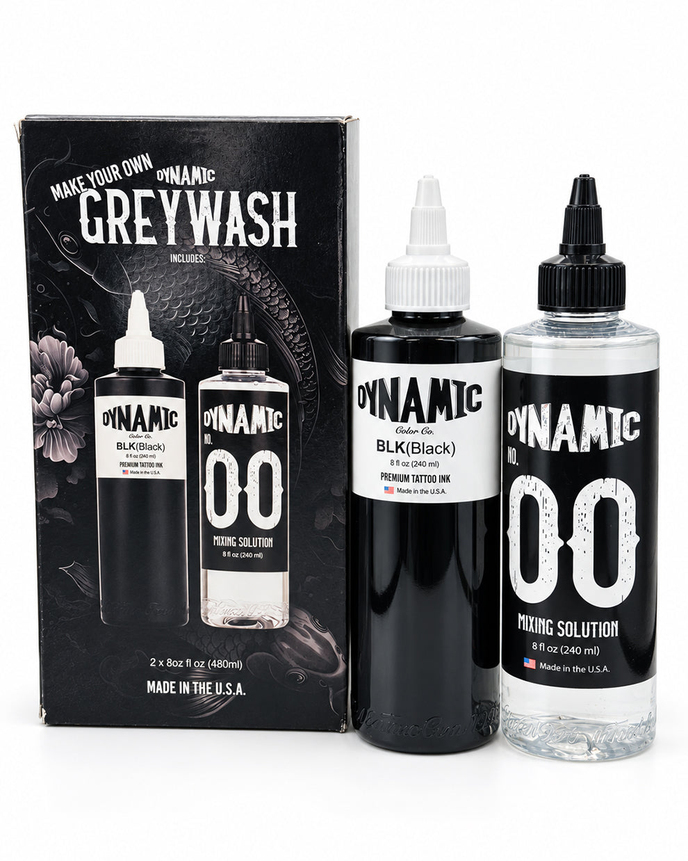 A Dynamic Ink Greywash kit featuring a black packaging box, a black bottle of dynamic ink, and a clear bottle of mixing solution pulling solution on a white background.