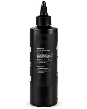 Black tattoo ink bottle with visible label on a white background