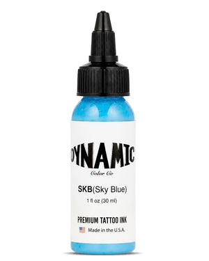A 1 fl oz (30 ml) bottle of Dynamic Color Co. SKB (Sky Blue) ink, featuring a bright blue liquid inside a translucent bottle with a black cap and a white label.