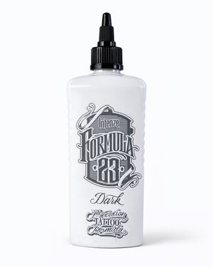 Intenze Formula 23 Dark tattoo ink bottle with precision tattoo formula label, studio product photo on white background, Coz Tattoo Supplies