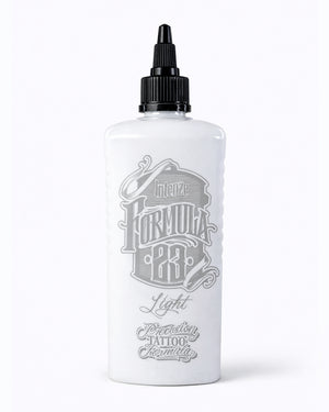 Intenze Formula 23 Light tattoo ink bottle 12oz on pure white background, professional studio product photo by COZ Tattoo Supplies