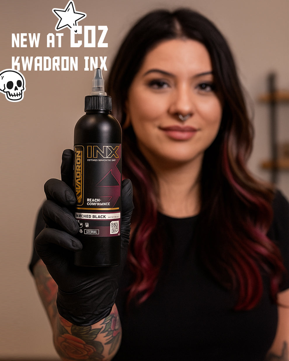 New at COZ - Kwadron INX Black Tattoo Ink held by artist.