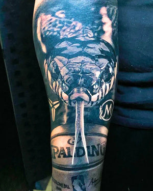Realistic Black Mamba snake and basketball tattoo sleeve created with Intenze True Black Tattoo Ink.